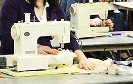 Students in an introductory sewing class