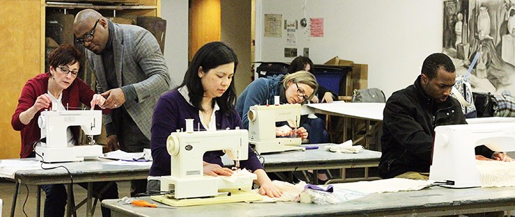 Students in an introductory sewing class