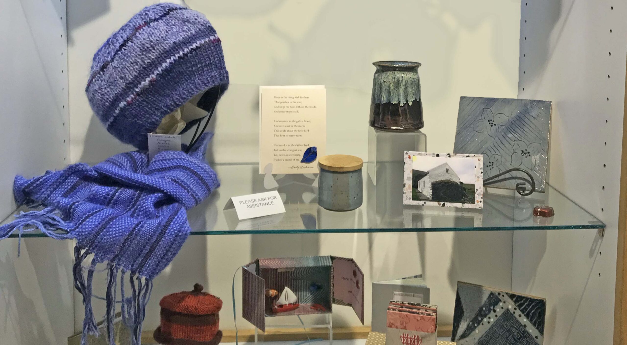 purple hat and scarf shelf